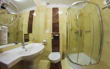 Фото номера Стандартный двухместный номер с 2 отдельными кроватями Отель Hotel Pikul г. Пулавы 12